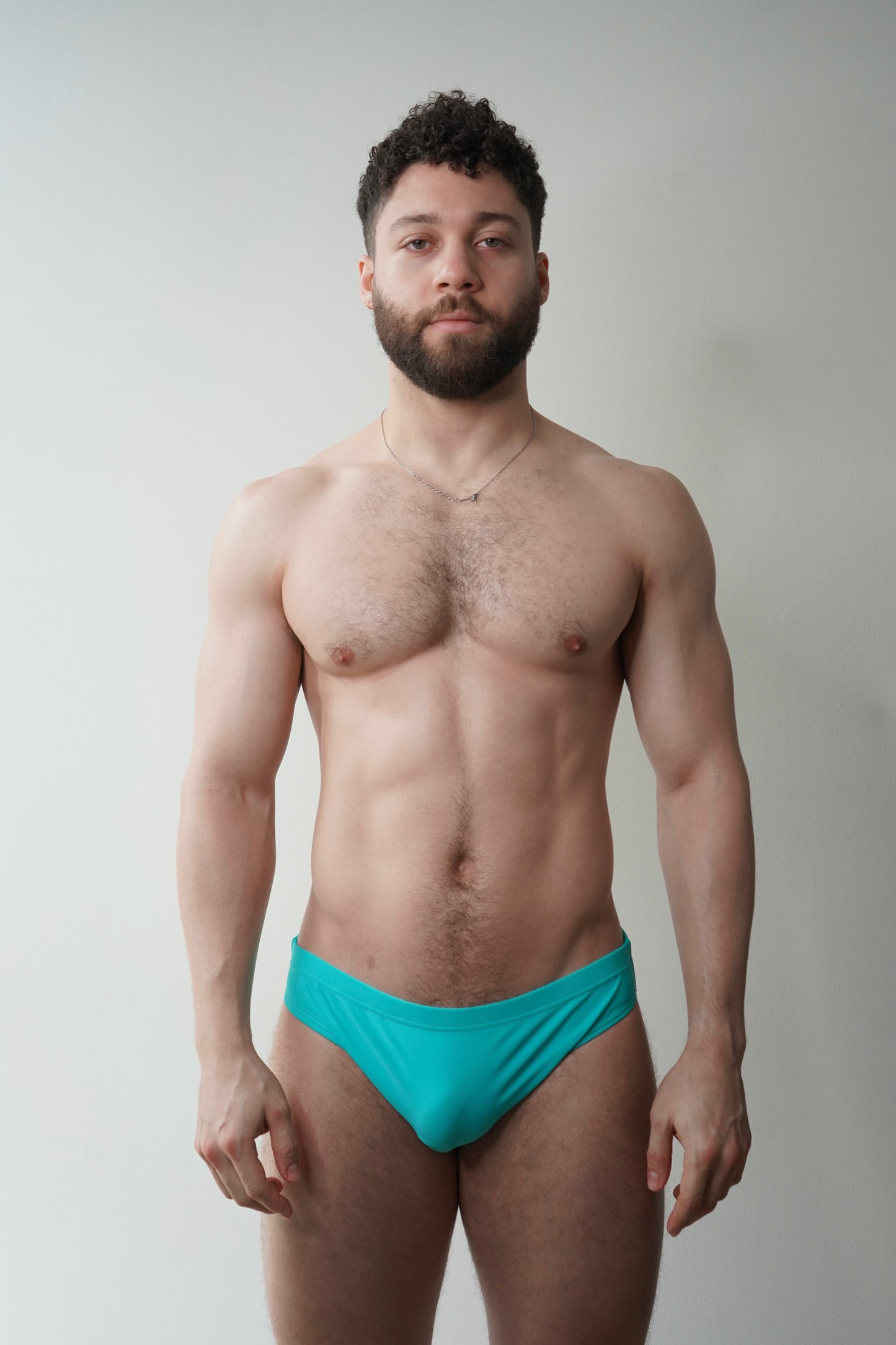 swim brief in turquoise