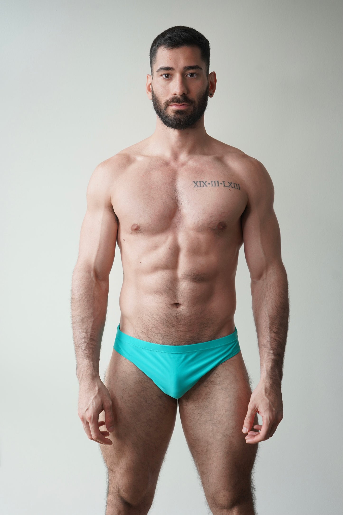 swim brief in turquoise